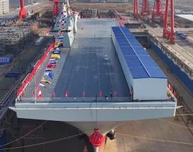 中国首艘076型舰顺利下水,电磁弹射引领世界